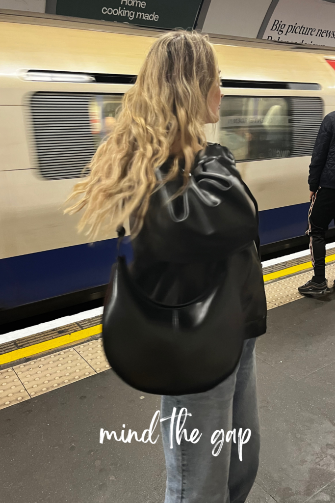 blonde woman on london tube 