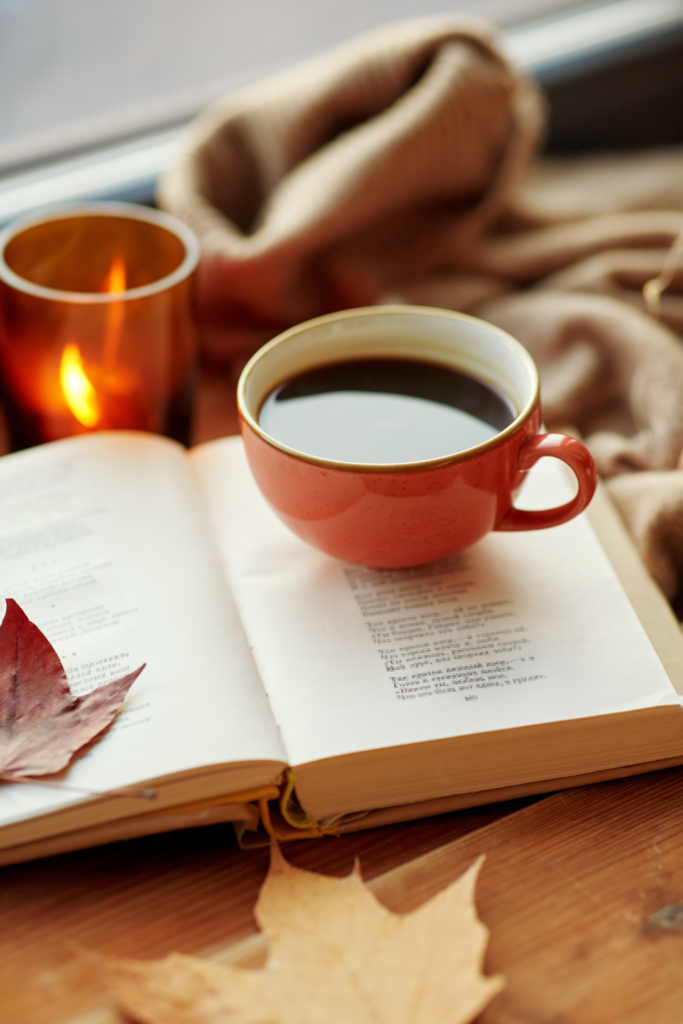 coffee with a book and fall candle 