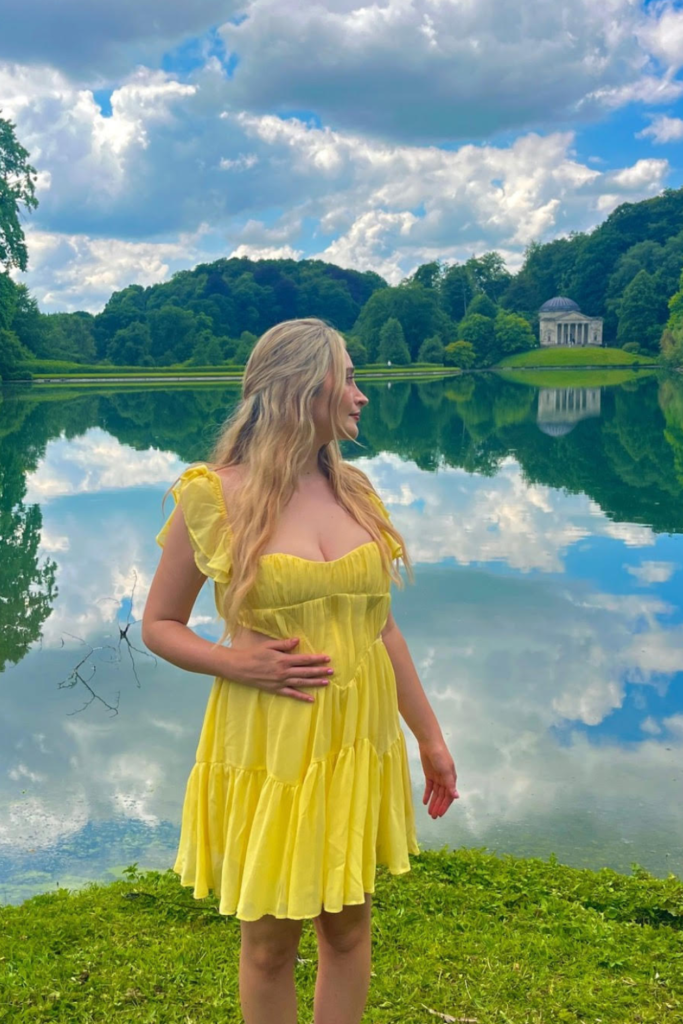 girl at Stourhead in a yellow dress