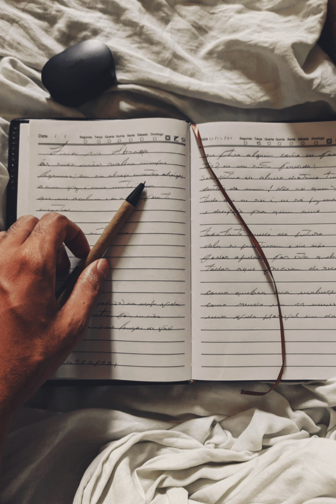 writing a diary in bed